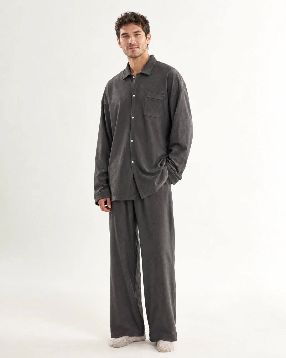 Woman wearing the grey CASUCA pet-hair-resistant loungewear set