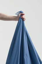 Close-up showing the soft surface of the Prussian blue CASUCA cooling comforter