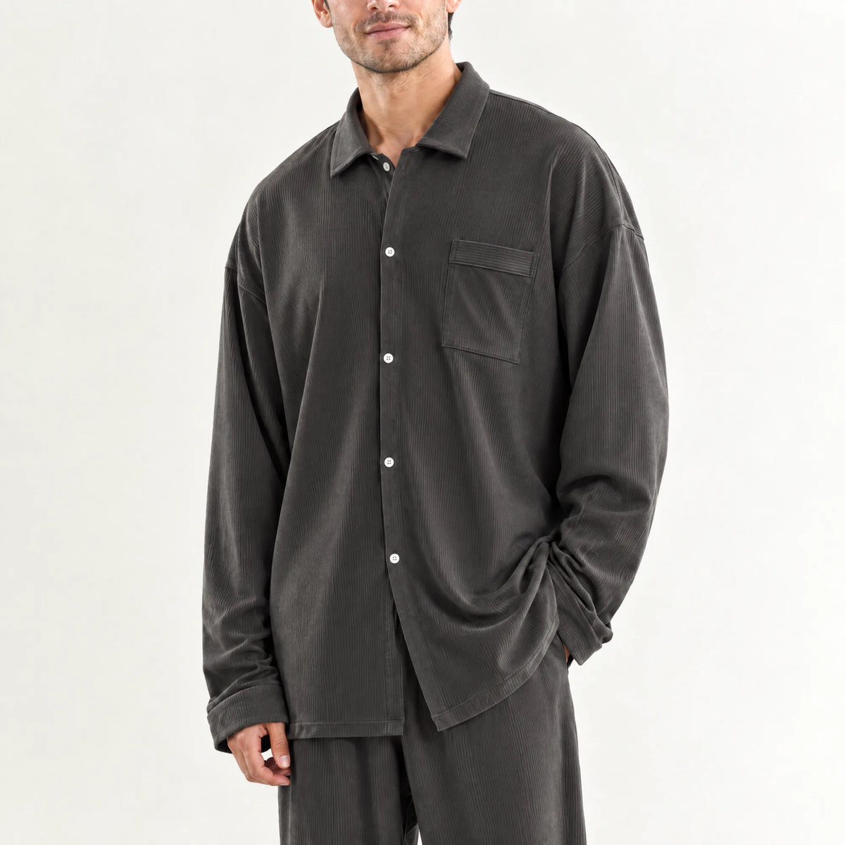 Collar and chest pocket detail on the grey CASUCA pet-hair-resistant loungewear set