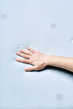 Close-up of the cool-touch fabric on the Prussian blue CASUCA cooling comforter