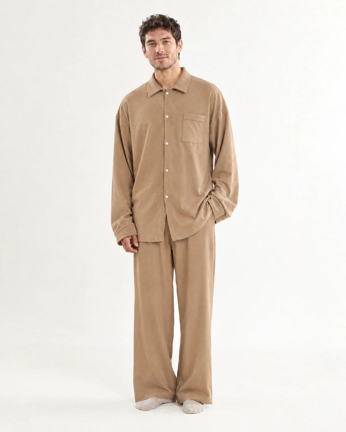 Woman wearing the khaki CASUCA pet-hair-resistant loungewear set