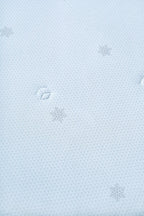 Detail of the fabric pattern on the Prussian blue CASUCA cooling comforter