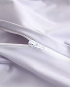 Concealed zipper detail on the purple CASUCA cooling pet-hair-resistant bedding set