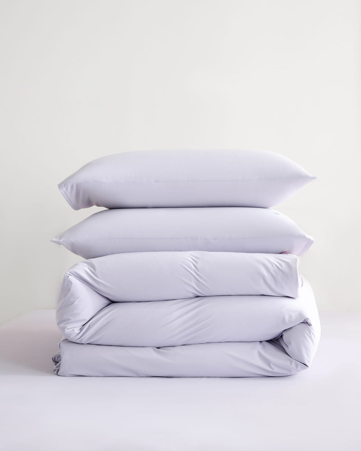 Folded purple CASUCA cooling pet-hair-resistant bedding set