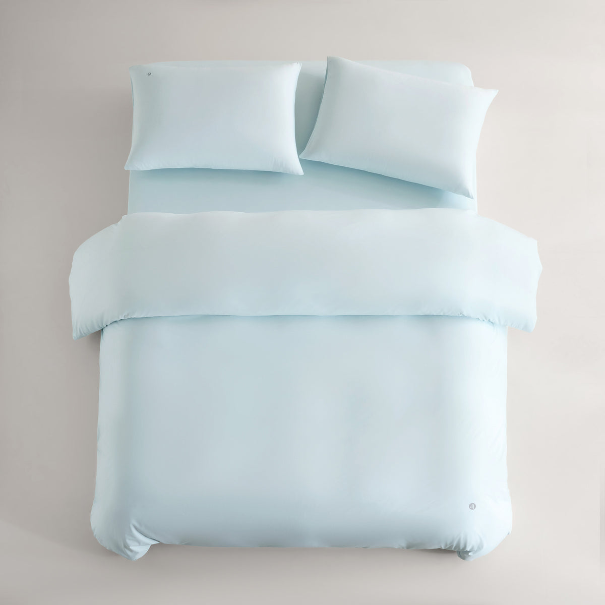 CASUCA cooling pet-hair-resistant four-piece bedding set on a styled bed