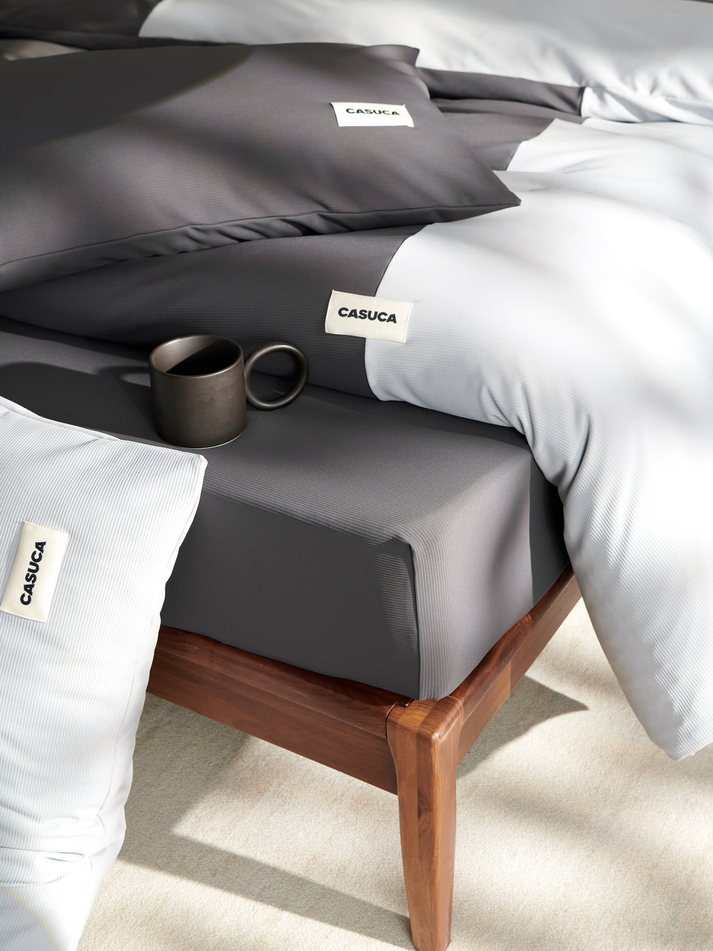 Pillow detail on the blue Peecatboo pet-hair-resistant four-piece bedding set