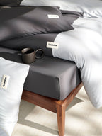 Pillow detail on the blue Peecatboo pet-hair-resistant four-piece bedding set