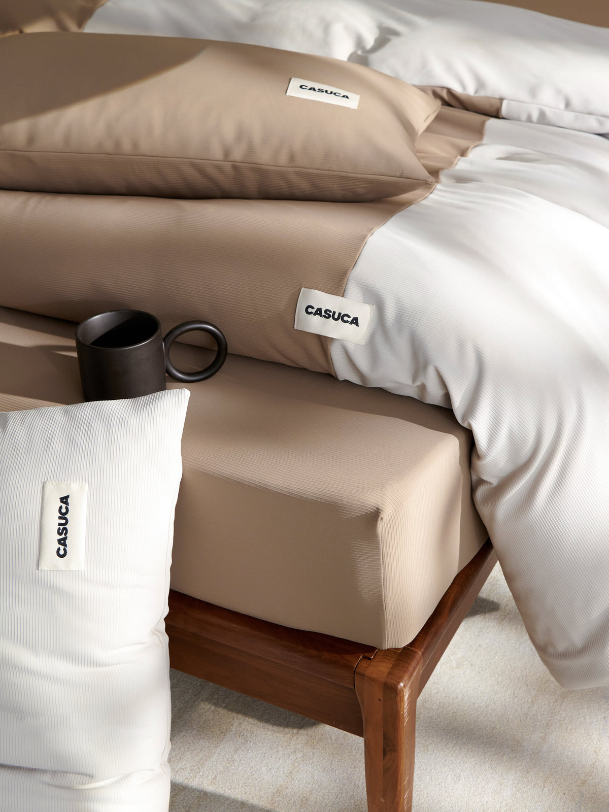 Pillow detail on the brown Peecatboo pet-hair-resistant four-piece bedding set