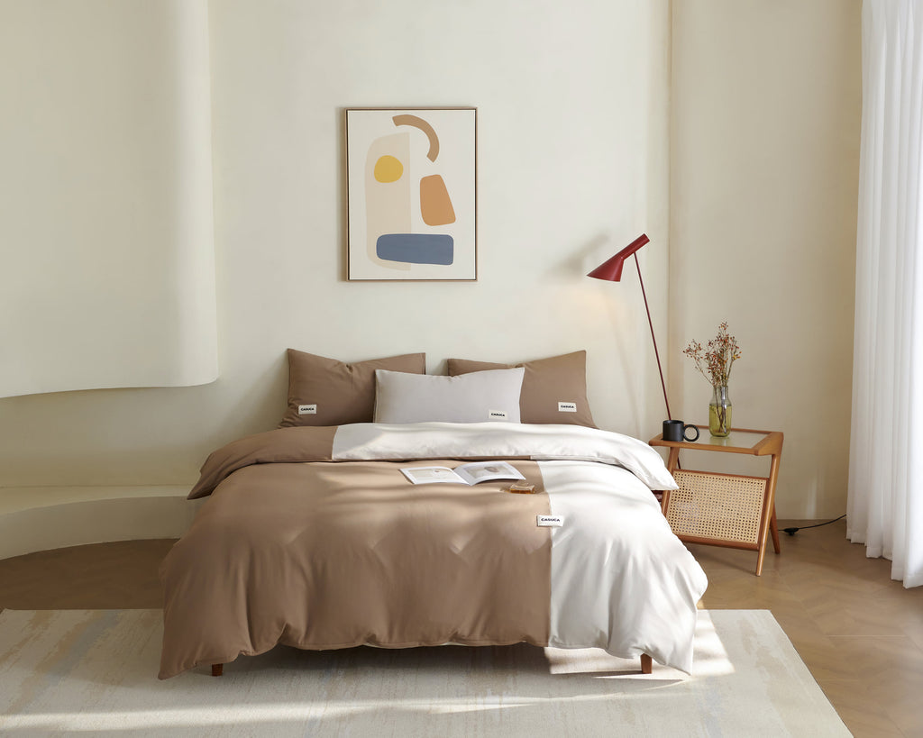 Brown Peecatboo pet-hair-resistant four-piece bedding set arranged on a styled bed