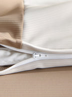 Concealed zipper detail on the brown Peecatboo pet-hair-resistant four-piece bedding set