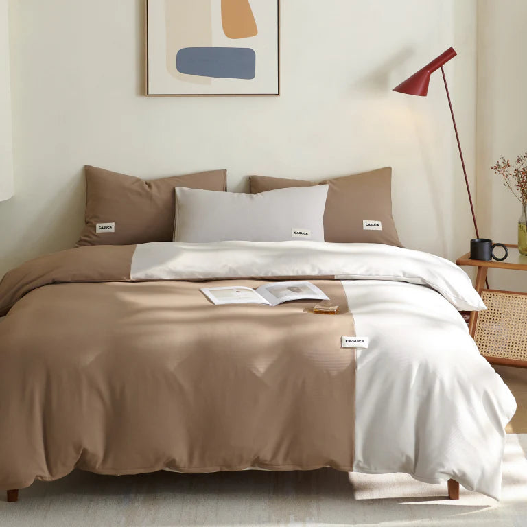 Peecatboo brown and ivory bedding in a warm bedroom